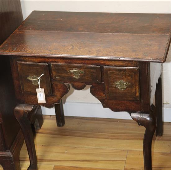 An early18th century oak lowboy, W.75cm